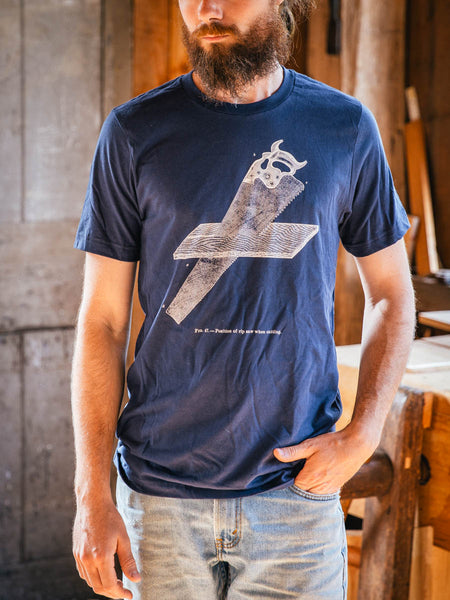 T-Shirts and Stickers Now in Stock!