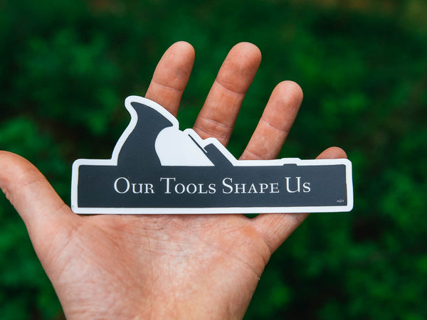 “Our Tools Shape Us” Sticker